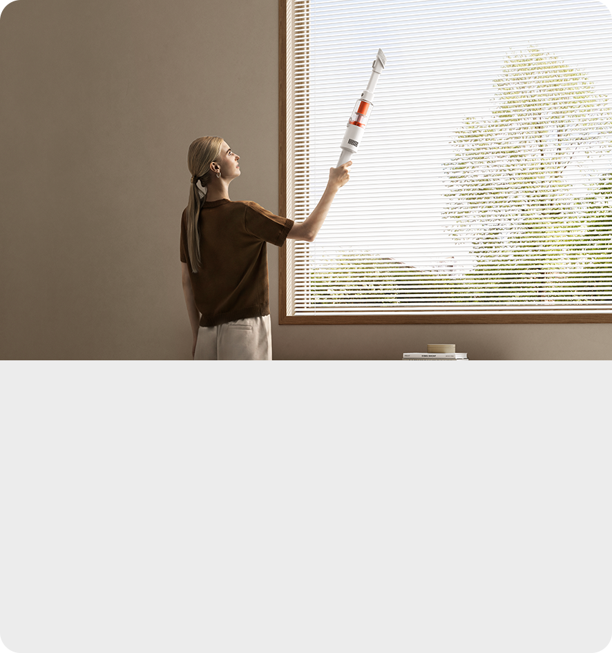 Aspiradora Xiaomi Vacuum Cleaner P30 GL limpiando debajo de muebles