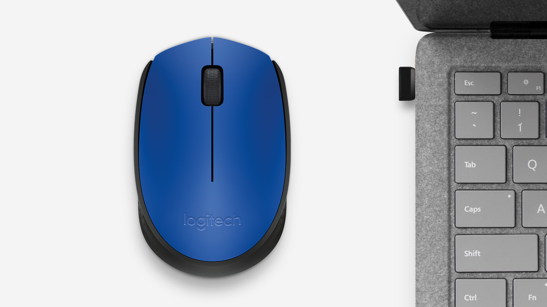 Logitech M170 junto a notebook, imagen referencial oficial