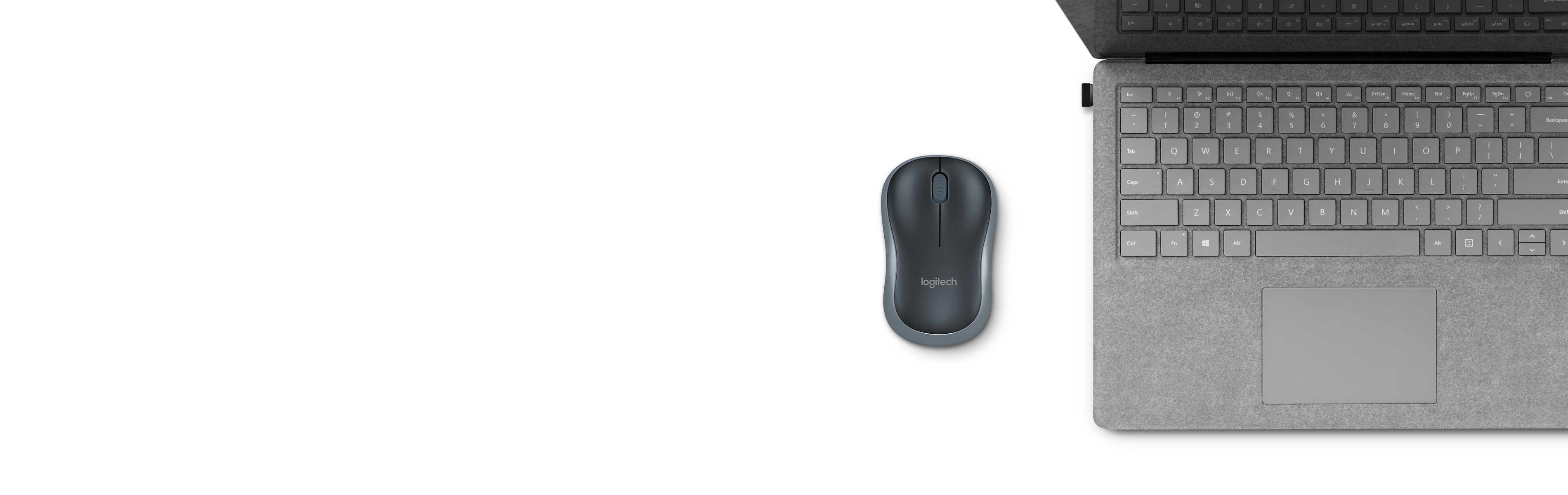 Logitech M185 junto a notebook, imagen referencial oficial