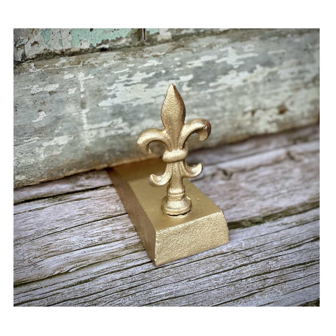 Tope de puerta Flor de Lis